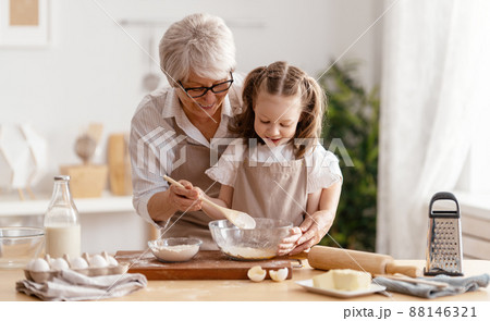 family are preparing bakery together family are preparing bakery together 88146321