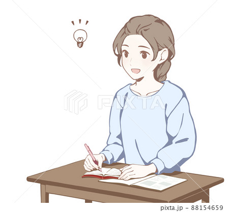 机に向かい文字を書く女性(ひらめき/笑顔) 88154659