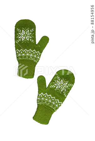 pair of green knitted mittens with christmas pattern isolated on pair of green knitted mittens with christmas pattern isolated on 88154956
