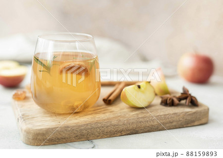fruity apple tea with honey and cinnamon in a glass bottle 88159893