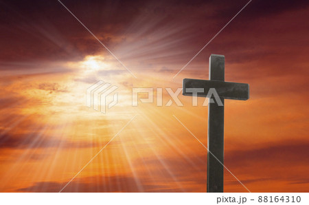 cross stand against a dramatic evening sky 88164310