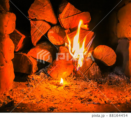 Hot flame and firewood in old stove in the village Hot flame and firewood in old stove in the village 88164454