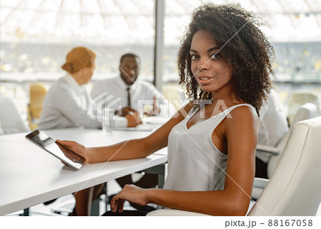 African businesswoman sitting at office room using tablet 88167058