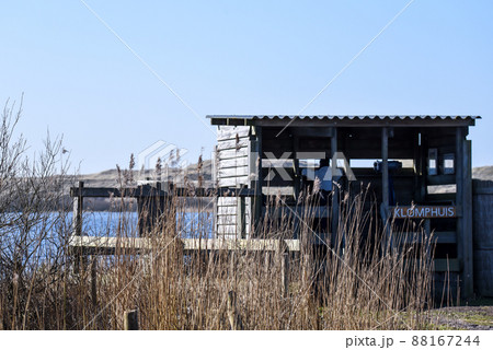 Callantsoog, Netherlands, March 2022. Bird hide in the Zwanenwater Callantsoog, Netherlands, March 2022. Bird hide in the Zwanenwater 88167244