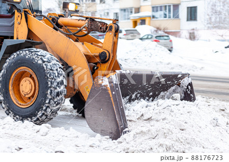 Cleaning and cleaning of roads in the city from snow in winter 88176723
