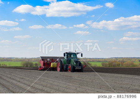 planting a potato 88176996
