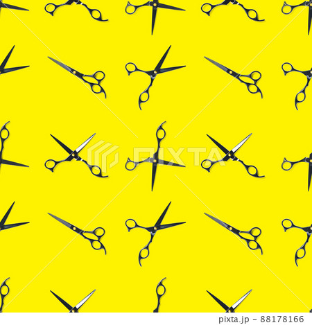Seamless pattern of black scissors. professional hairdresser black scissors isolated on yellow. Black barber scissors, close up. pop art background 88178166