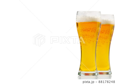 Fresh cold Beer glass isolated on white. gold beer bavaria oktoberfest with foam crown. pint of light lager beer on white background 88178248