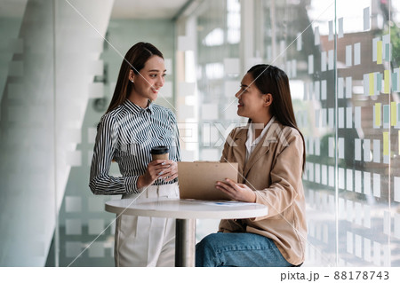 Group of asian businesswoman and Accountant checking data document on paperwork chart report for investigation of corruption account Group of asian businesswoman and Accountant checking data document on paperwork chart report for investigation of corruption account 88178743