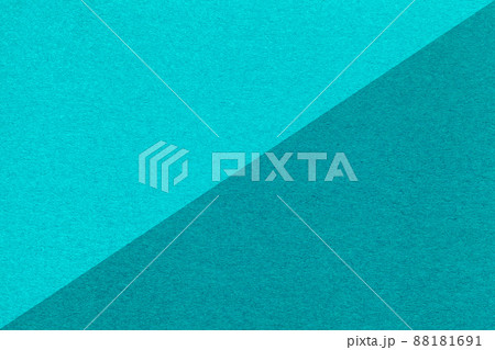Texture of craft light blue and turquoise paper background, half two colors, macro. Structure of cerulean cardboard. 88181691