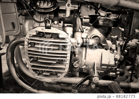 Close up of engine of antique motorcycle, black and white 88182775