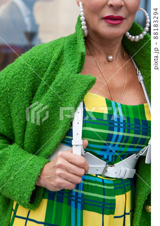Stylish woman in warm wool green coat. Style, Street fashion trend look 88183294