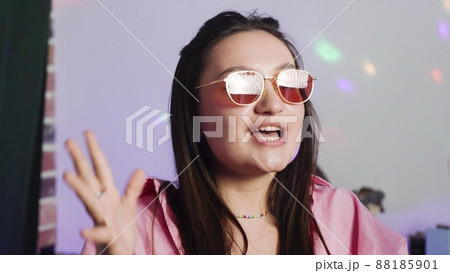 Close-up. The girl presses the record button on her smartphone and keeps a blog. Social network. Blogger 88185901
