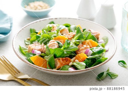 Salmon orange salad with pine nuts, red onion and corn salad. Breakfast. Ketogenic diet Salmon orange salad with pine nuts, red onion and corn salad. Breakfast. Ketogenic diet 88186945