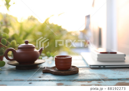 Asian teapot and tea cup Asian teapot and tea cup 88192273