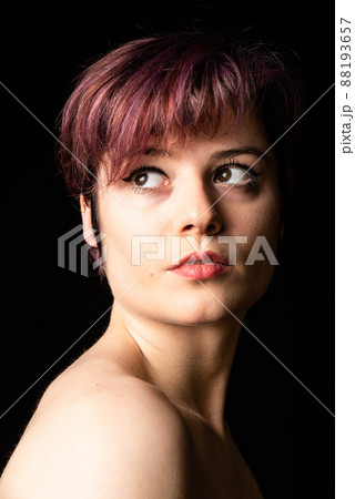 Fashion portrait of a 23 year old white woman with short, dyed hair Fashion portrait of a 23 year old white woman with short, dyed hair 88193657