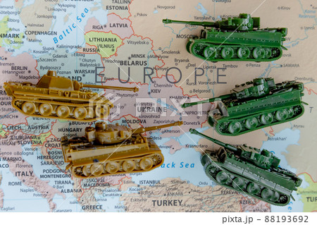 Calgary, Alberta, Canada. Mar 28, 2022. Top view of Scale Model Tanks War Panther Tanks on a Ukraine map. Concept Calgary, Alberta, Canada. Mar 28, 2022. Top view of Scale Model Tanks War Panther Tanks on a Ukraine map. Concept 88193692