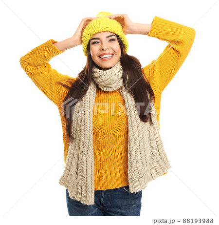 Happy young woman in warm clothes on white background. Winter vacation Happy young woman in warm clothes on white background. Winter vacation 88193988