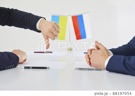 Representative of Ukrainian side at talks expresses his dissatisfaction by pointing his thumb down. Representative of Ukrainian side at talks expresses his dissatisfaction by pointing his thumb down. 88197054