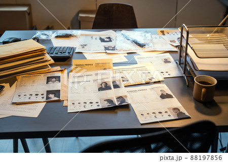 Workplace of fbi agent with criminal profiles, evidences and clues Workplace of fbi agent with criminal profiles, evidences and clues 88197856
