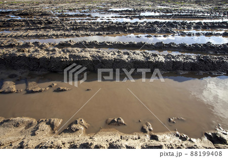 very poor conditions for the movement of cars on the field in autumn rains 88199408