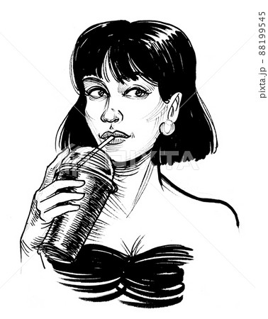 Pretty woman drinking cocktail with a straw 88199545