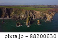 huge rocks and cliffs in the middle of the Atlantic Ocean in a UNESCO protected geopark, Stradbally Cove, on the Cooper Coast, Waterford, Ireland. 88200630