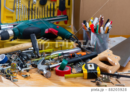 Repair tools on wooden background Repair tools on wooden background 88203928
