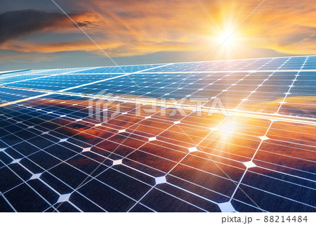 Photo collage of sunset and solar panel, photovoltaic, alternative electricity source - concept of sustainable resources 88214484