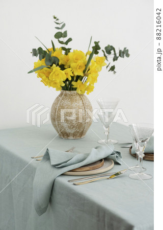 Concept of romanitic Easter table with flowers 88216042