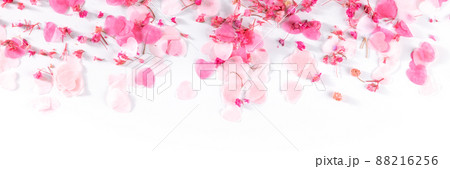 Valentine day or wedding panorama with pink hearts and flowers confetti Valentine day or wedding panorama with pink hearts and flowers confetti 88216256