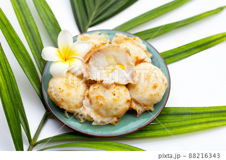 Khanom Krok, Thai coconut milk dessert. Coconut rice pancake Khanom Krok, Thai coconut milk dessert. Coconut rice pancake 88216343