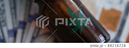 Glass bottle with cannabinoid oil Glass bottle with cannabinoid oil 88216728