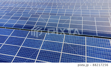 Aerial drone view flight over solar panels on sunny day close-up. Photovoltaic Aerial drone view flight over solar panels on sunny day close-up. Photovoltaic 88217256