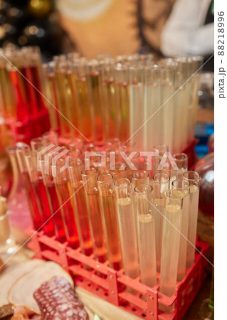 Laboratory glassware with alcohol cocktail's on chemical party. Laboratory glassware with alcohol cocktail's on chemical party. 88218996