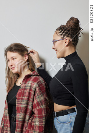 piercings on an ear. Conch and helix piercings close up. piercings on an ear. Conch and helix piercings close up. 88220321