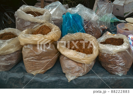 Bags full of tobacco fibers sold in the local market in Medan North Sumatra, Indonesia 88222883