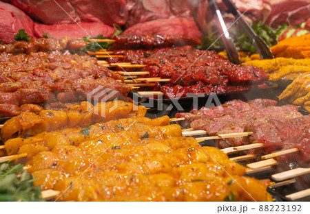 Showcase with a variety of raw meat Dishes. Showcase with a variety of raw meat Dishes. 88223192