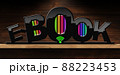 E-Book Symbol With Multi Colored Books on a Wooden Shelf 88223453