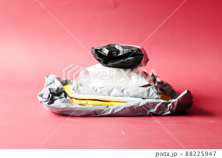 stack of delivery package red background  88225947