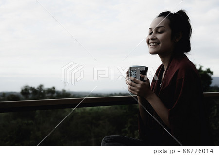 Series photo of young woman hand holding ceramic mug, positive emotion, chill and joyful Series photo of young woman hand holding ceramic mug, positive emotion, chill and joyful 88226014