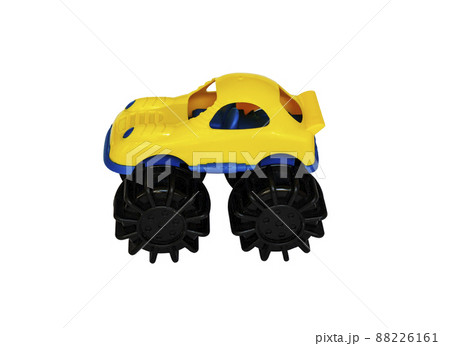 Children's yellow plastic toy car on a white background Children's yellow plastic toy car on a white background 88226161