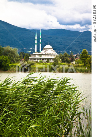 White mosque by the lake, mountain view among green reeds, Sakarya Akyazi Turkey White mosque by the lake, mountain view among green reeds, Sakarya Akyazi Turkey 88228390