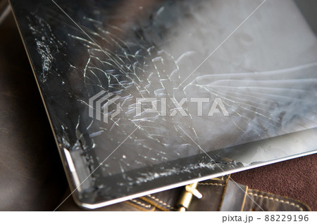 Tablet computer with broken glass screen Tablet computer with broken glass screen 88229196
