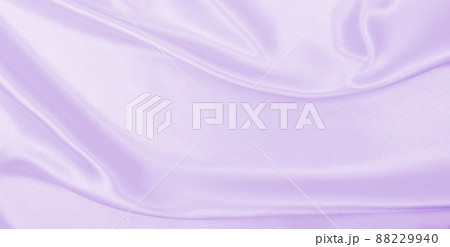 Smooth elegant lilac silk or satin texture as wedding background. Luxurious background design Smooth elegant lilac silk or satin texture as wedding background. Luxurious background design 88229940