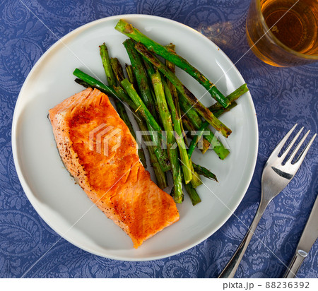 Fresh salmon steak with bunch of roasted asparagus Fresh salmon steak with bunch of roasted asparagus 88236392