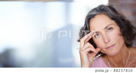 In deep reflection about the past week. Portrait shot of a mature woman looking thoughtful. In deep reflection about the past week. Portrait shot of a mature woman looking thoughtful. 88237810