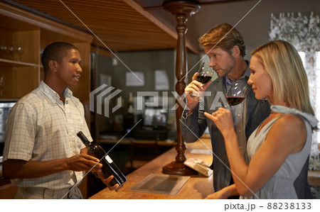 this was a good year. Shot of a couple enjoying a wine tasting. 88238133