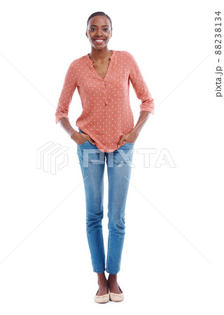 Feeling fresh today. Studio shot of an attractive young woman with her hands in her pockets. 88238134