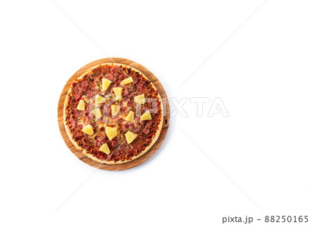 Hawaiian pizza with pineapple,ham and cheese Hawaiian pizza with pineapple,ham and cheese 88250165